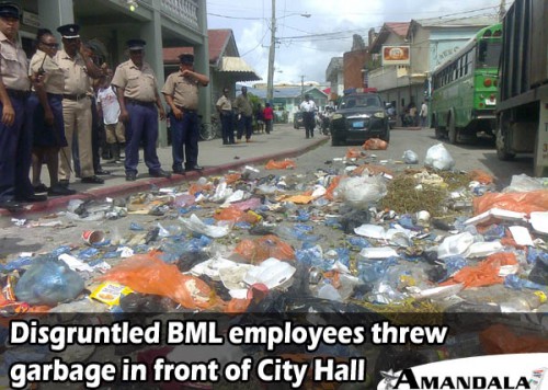 Disgruntled BML employees throwing garbage in front of City Hall copy