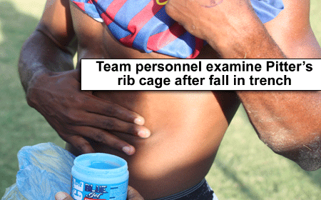 Team-personnel-examine-Pitt