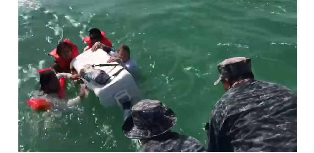 Capsized boat in Belize. All were safely rescued